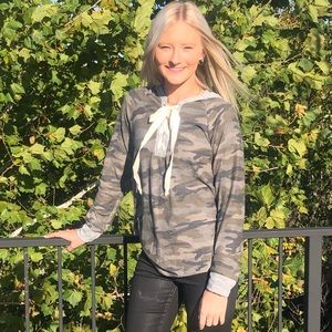Plus size camouflage lace up long sleeve hoodie